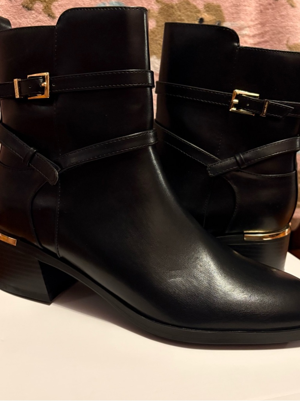 Calvin Klein Black Leather Ankle Booties with Gold Buckle Accent